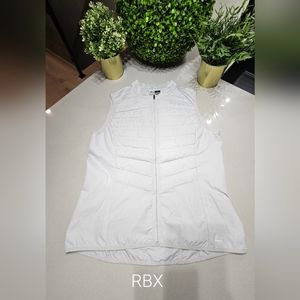 RBX Impeccable veste sportive sans manche grise claire avec poche arrière